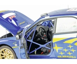 IXO 520010110Subaru Impreza Rally MC 2003 1:8 Metall Standmodellbausatz 859 Bauteile - Hochdetailliert mit Licht & Sound
