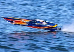 Traxxas 103076-4-ORNGSET1SPARTAN SR 36-Zoll Rennboot Brushless RTR, orange Set 1 mit Traxxas Duo Ladegerät + 2x 3S LiPo-Akku 5000mAh